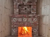 Угловой камин с открытой топкой из старинного кирпича