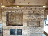 Отопительная печь с тёплой лавкой, совмещенная с классическим камином с открытой топкой, фото 4