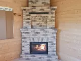 Угловой теплонакопительный камин из немецкого кирпича Kratki Wiktor
