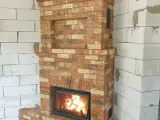 Угловой камин уникальной конструкции из кирпича Terca